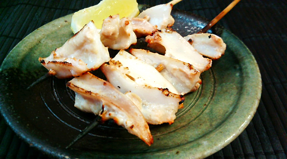 Cartilage Couple of the Cartilage "Kushi" on Small Dish with a piece of Lemon