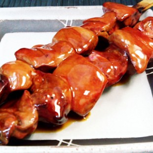 2 sticks of livers on the dish.