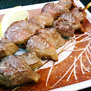 2 sticks of Gizzard on the dish