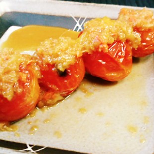 A stick of Petite tomato on the dish
